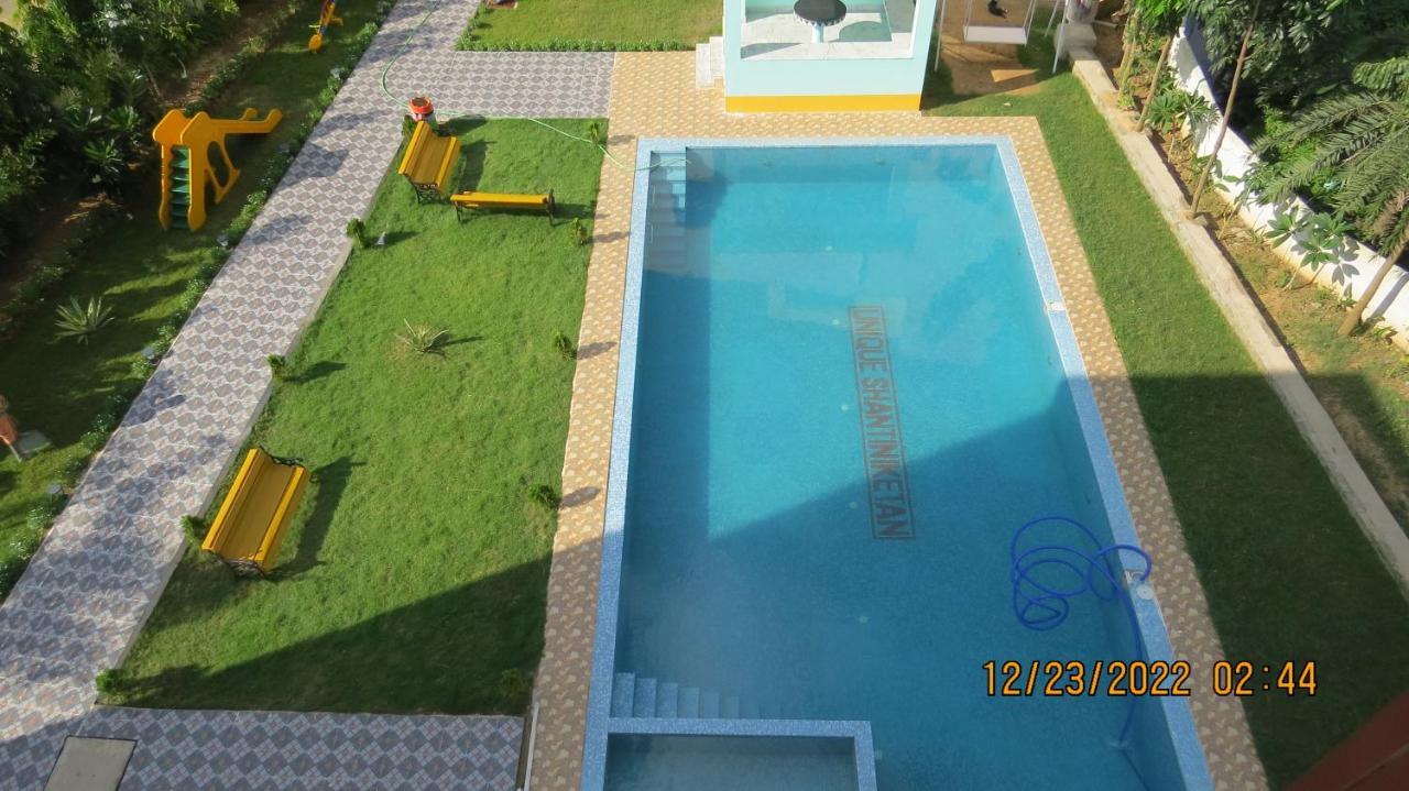 Unique Shantiniketan Hotel Sri Niketan Bagian luar foto