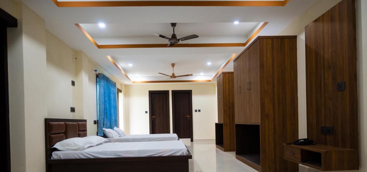Unique Shantiniketan Hotel Sri Niketan Bagian luar foto